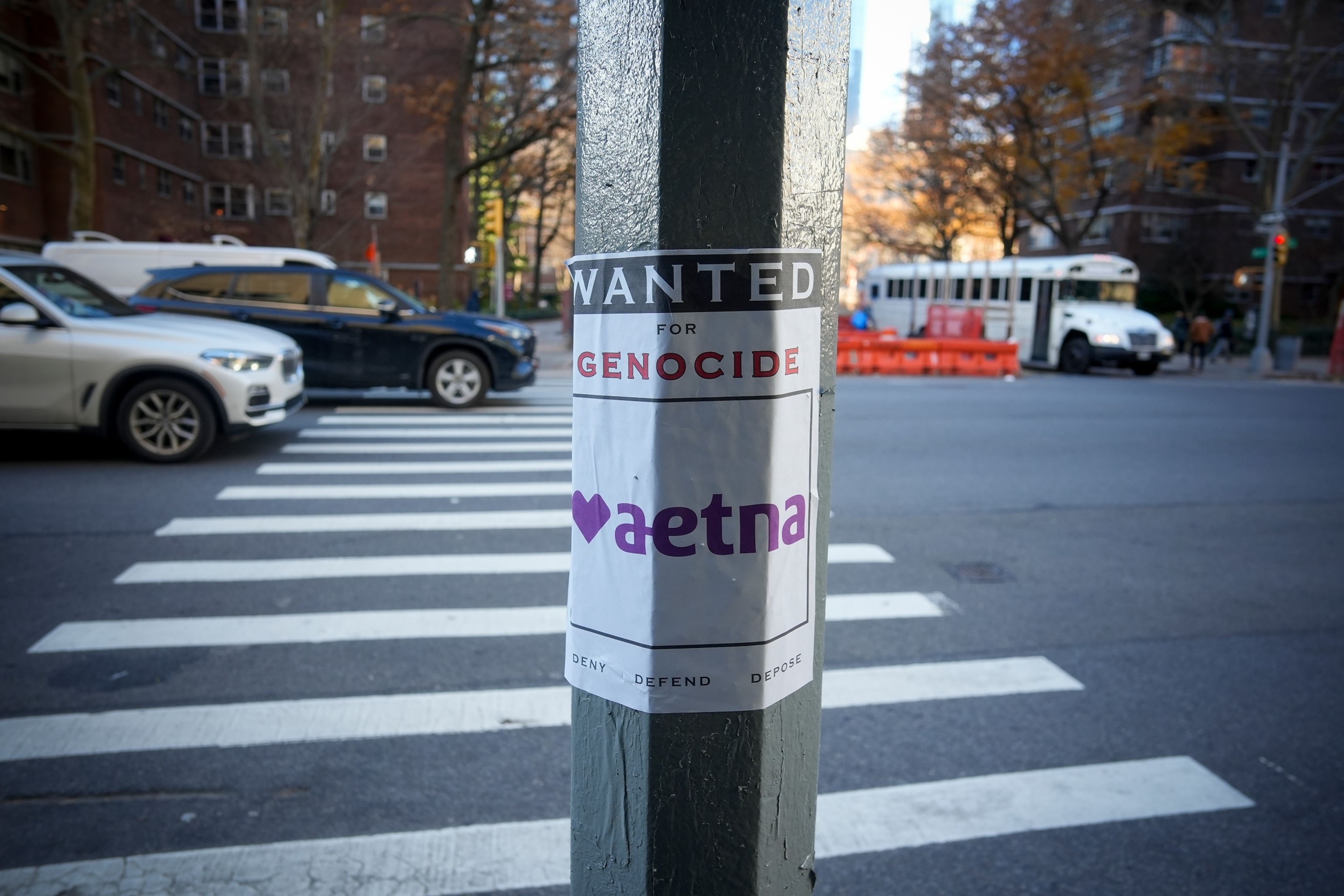 PHOTO: A poster accusing the Aetna insurance company of genocide on a lamppost in New York, Dec. 13, 2024.